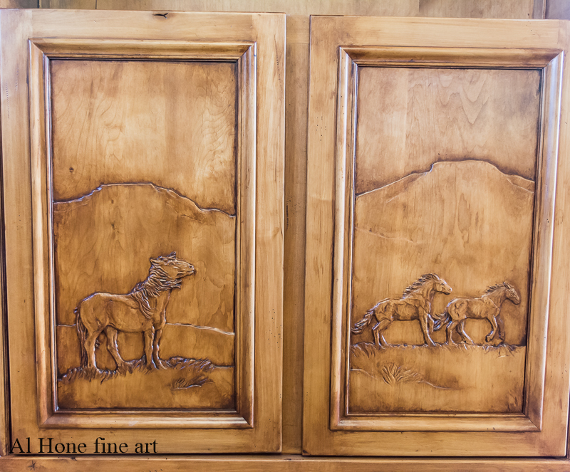 Custom carved bookcase with horses